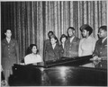 "Marian Anderson, world's greatest contralto, entertains a group of overseas veterans and WACs on (the) stage of the San - NARA - 535928.tif